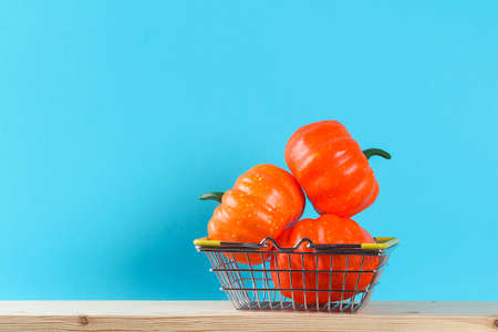 Halloween holiday concept with pumpkin decor on wooden table. Sale time.