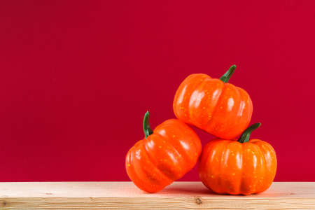 Halloween holiday concept with pumpkin decor on wooden table. Sale time.の写真素材
