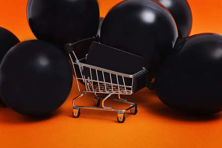 Black Friday shopping sale concept with red and black color. Red background.の写真素材