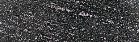 Banner. The black wall is covered with snow patterns. Frost on the painted wall. Freezing hoarfrost,...