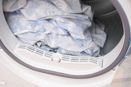 Drying machine in the house for drying linen, clothes, bed linen. Dryer.