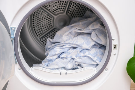 Drying machine in the house for drying linen, clothes, bed linen. Dryer.