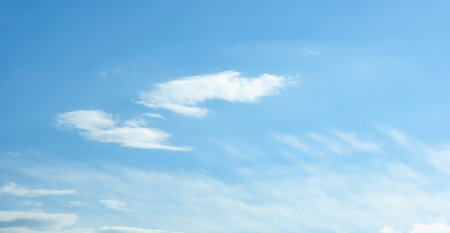 Blue sky with white clouds. Beautiful cloudy sky. Skyward. Endless skyline. The sky at dawn. Banner.の写真素材