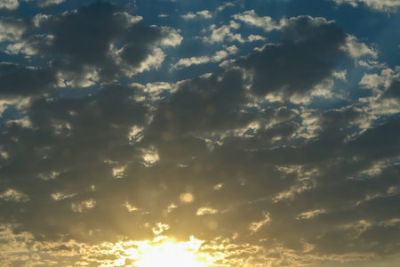 Thunderclouds at dawn. Thunderclouds at sunset. A thunderstorm during the sun.