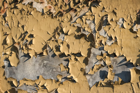 Metal background with cracked paint. The texture of the exfoliating paint of the paint. Background...