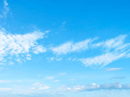 Fantastic soft white clouds against blue sky