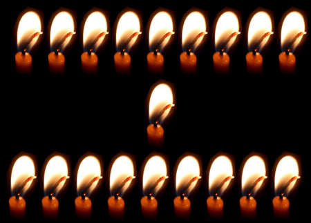 Candlelight blurred black background.の写真素材