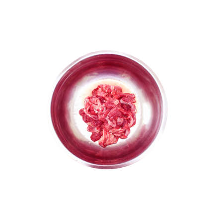 raw meats on round container isolated on white background.の写真素材