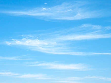 Fantastic soft white clouds against blue skyの写真素材