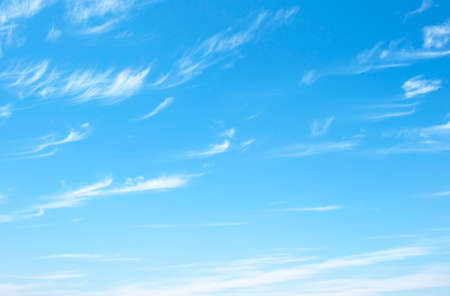 Fantastic soft white clouds against blue skyの写真素材