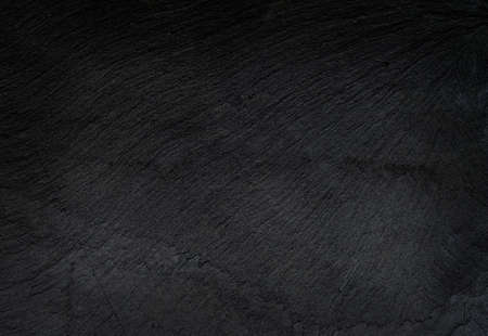Dark grey black slate background or texture.