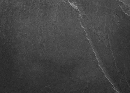 Dark grey black slate background or texture.の写真素材