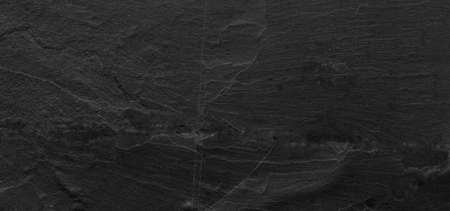 Dark grey black slate background or texture.の写真素材