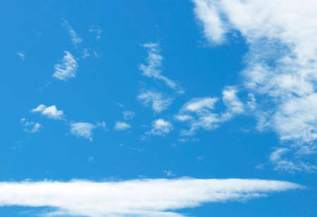 Fantastic soft white clouds against blue sky background.