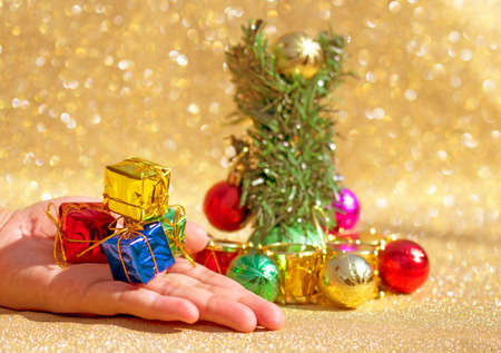 Christmas card with fir and decor on glitter backgroundの写真素材