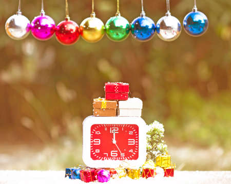 Clock with Christmas backgroundの写真素材