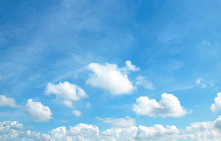 The sky is vast and the clouds are white.の写真素材