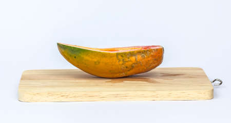 Papaya on a wooden background