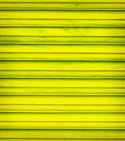 Green wood wall backgroundの写真素材