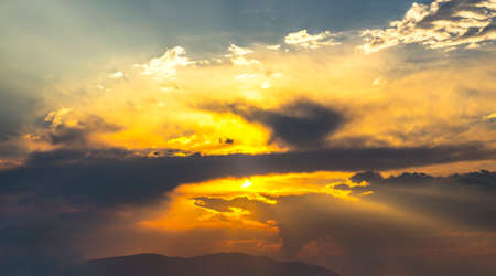 The vast sky and white clouds and sun