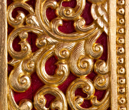 Pattern gold paint in the temple background of thailandの写真素材