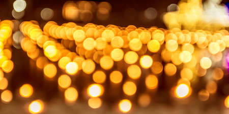 Gold glitter lights texture bokeh background Christmasの写真素材
