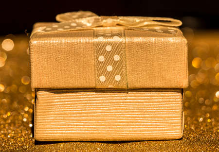 Sparkling gold paper and gift boxes