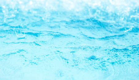 Bokeh light background in the pool Blue water