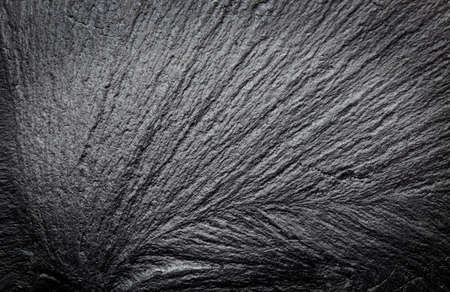 Dark grey black slate stone texture abstract background