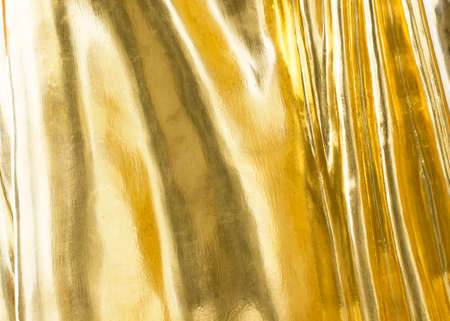 gold polished metal steel texture abstract backgroundの写真素材