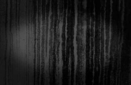Abstract background of old black wallの写真素材