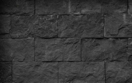Black brick wall texture, brick surface for background. Vintage wallpaper.