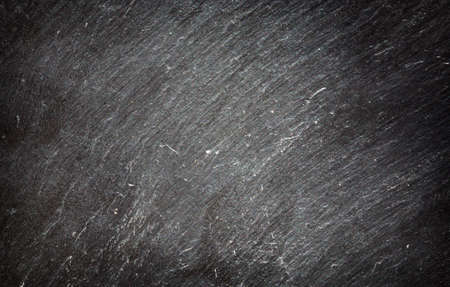 Dark grey black slate background or texture.
