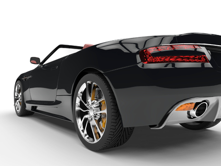 Black convertible sports car - taillight extreme closeupの写真素材