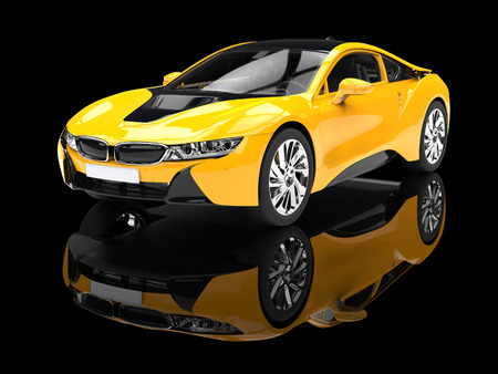 Modern yellow sports car - isolated on black reflective background.の写真素材