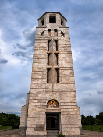 Church belltower with stormy skies in the backgroundの写真素材