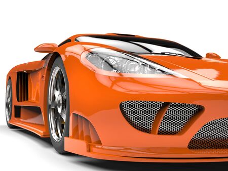 Tangerine orange modern super sports car - headlight extreme closeup shotの写真素材