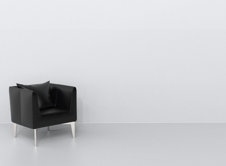 Black leather armchair with black pillow - top down viewの写真素材