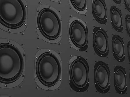 Wall of slick black loudspeakers