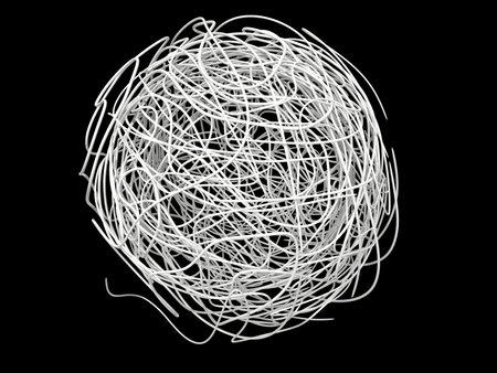 Ball of tangled white wires - isolated on black backgroundの写真素材