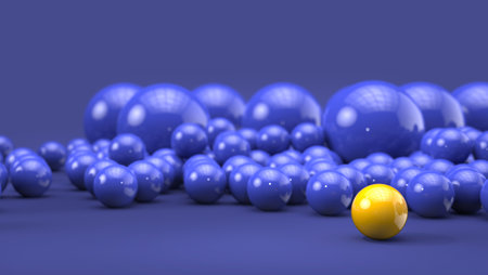 Bright yellow ball stands out on blue background filled with blue spheres - background templateの写真素材