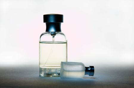 Two perfume bottles, on gradient backgroundの写真素材