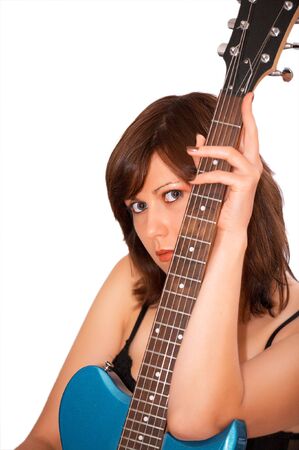 Young beautiful woman with guitar, isolatedの写真素材