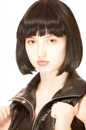 Young beautiful woman with black hair, isolated on whiteの写真素材