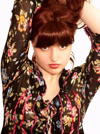 Young beautiful woman with red hair, isolatedの写真素材