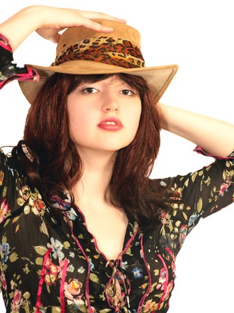 Young sensual woman in a hat, isolatedの写真素材