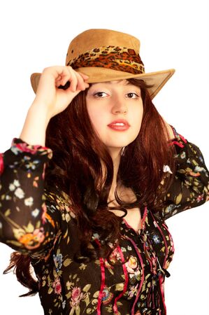 Young sensual woman in a hat, isolatedの写真素材