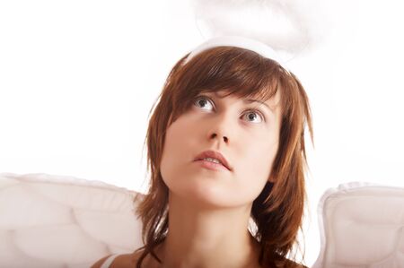 Angel with halo looking upの写真素材