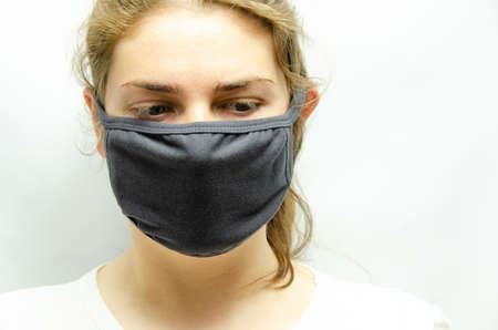 A girl in a medical maskの写真素材