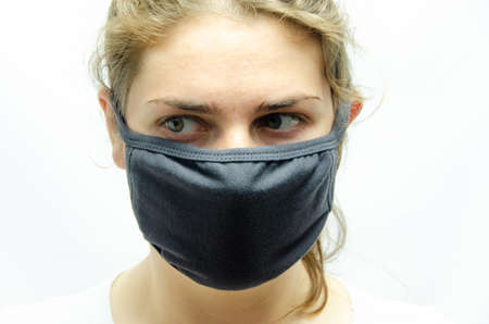 A girl in a medical maskの写真素材